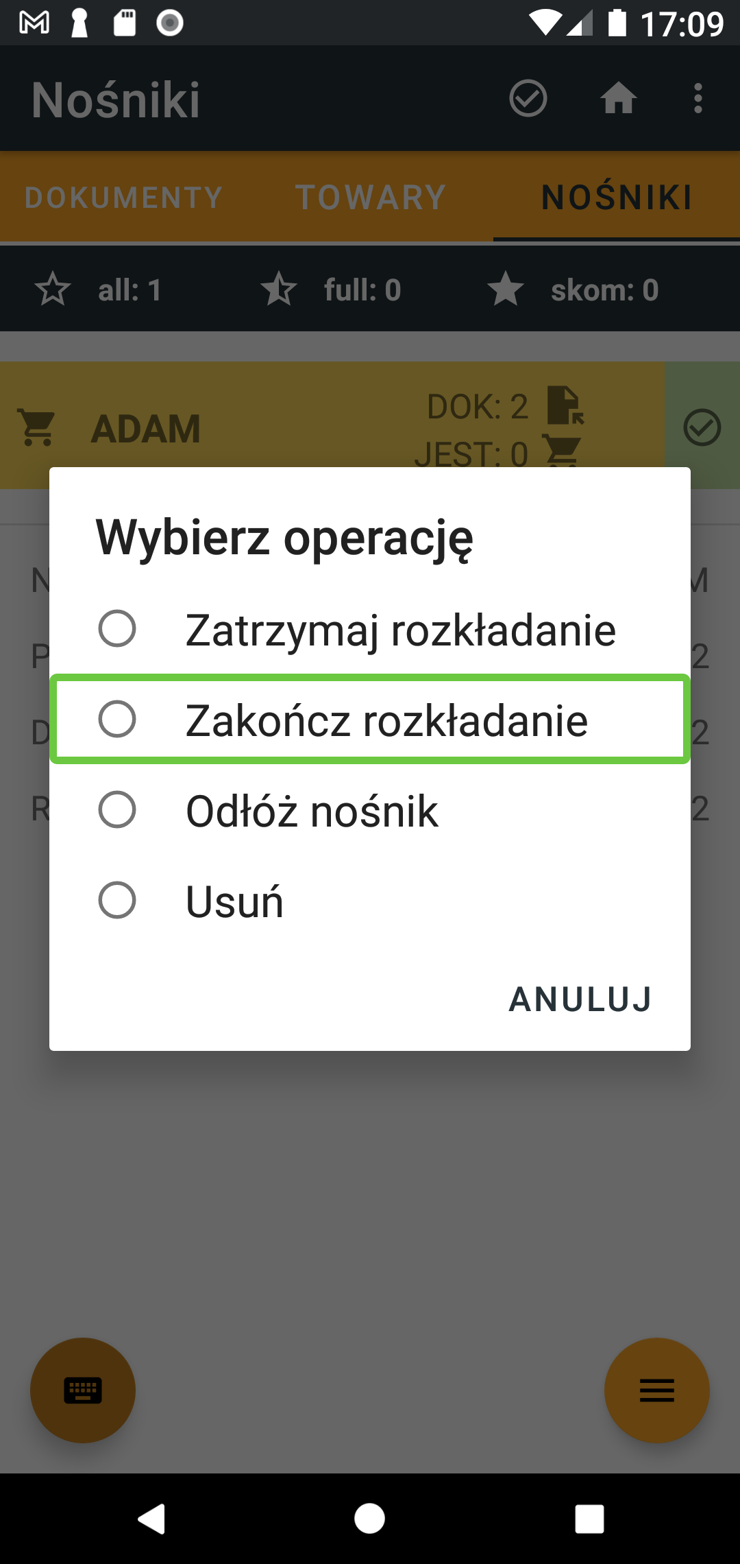 Menu kontekstowe nośnika z wybraną opcją zakończenia rozkładania.